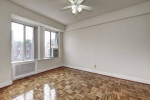 Spacious apartment with hardwood floors and large windows, featuring high-speed internet access in Northwest DC.