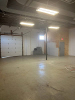 HEATED/ COOLED WAREHOUSE W DRIVE IN DOOR+OFFICE IN MIDTOWN FOR LEASE
