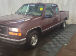 GMC 1500 SLT Extended Cab truck with low mileage, featuring power options and original interior.
