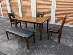 Table with 3 chairs and one bench