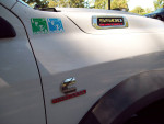Close-up of a 2020 Ram 5500 heavy-duty truck showing Cummins turbo diesel badge and inspection stickers.
