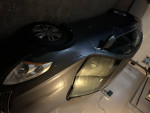 2012 Nissan Altima SL parked in garage with low mileage and maintenance history for sale.