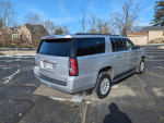2017 GMC Yukon XL with 60,000 miles parked, featuring a clean title and good condition for sale.