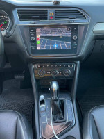 Interior view of a 2018 Volkswagen Tiguan S 4Motion with automatic transmission and navigation system.