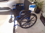 BRAND NEW WHEEL CHAIR