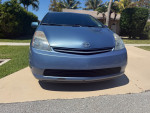 Front view of a blue 2007 Toyota Prius hatchback in good condition with 170,000 miles
