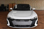 Front view of a 2022 Audi e-tron GT Premium Plus in Ibis White, showcasing luxury and electric performance.