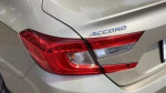 Close-up of the rear of a 2019 Honda Accord Sport showing the taillight and logo.