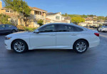 2018 Honda Civic EX-L sedan in white with 34,000 miles parked in a residential area, extra clean exterior.