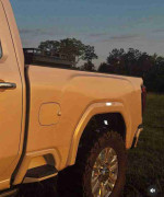 Side view of a 2006 GMC Sierra 1500HD SLT pickup truck showcasing its rugged design and powerful features