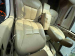 Interior view of a 2012 Chevrolet Impala showcasing leather seats and spacious cabin layout.
