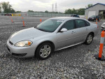 2011 Chevrolet Impala LS parked on gravel, reliable daily driver with 201,700 miles for sale at $3,000.