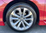 Close-up of a wheel on a 2014 Honda Accord EX, featuring a stylish design and Bridgestone tire.