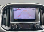 Rearview camera display showing parking area for the 2020 Chevrolet Colorado LT with low mileage.