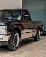 1992 Chevrolet S-10 EL truck with a 4.3 liter V6 engine, showcasing a sleek black exterior.