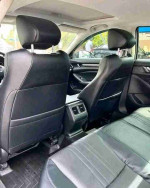 Interior view of a 2018 Honda Accord Sport with black leather seats and spacious cabin.
