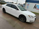 2012 Chevrolet Malibu LS for sale, white color, showing side profile and clean exterior, priced at $3,600.