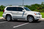 2007 Lexus GX 470 SUV in Blizzard Pearl over Ivory, showcasing luxury and robust performance.