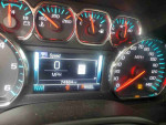 Dashboard of a 2019 Chevrolet Suburban displaying speed and odometer at 74,564 miles