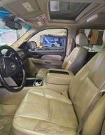 Interior view of a 2007 Chevrolet Tahoe LT with leather seats and sunroof