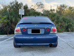 Rear view of a blue 2003 Lexus IS 300 in good condition with recent maintenance and lowered suspension.