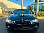 Front view of a well-maintained 2014 BMW 328I for sale with 103K miles in clean condition