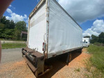 Rear view of a 1993 Chevrolet Tiltmaster Van Box Truck with an 18ft body, showing slight wear and tear.