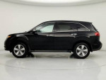 2012 Acura MDX with black exterior parked in a studio environment, showcasing its sleek design.