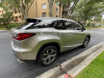 2017 Lexus RX 350 AWD parked on the street, showcasing its sleek design and luxury features