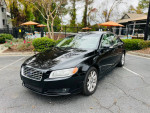 2009 Volvo S80 in black color parked near a pool, featuring leather interior and all power options.