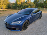 2017 Tesla Model S 75 in blue metallic, featuring premium black leather seats and panoramic glass roof.