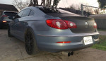 2010 Volkswagen CC Sport with black rims and carbon fiber accents parked outdoors
