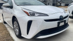 2021 Toyota Prius showcasing sleek design and eco-friendly features, perfect for fuel-efficient driving.