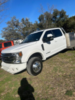 2022 Ford F350 Super Duty Crew Cab with utility bed, low mileage, well-maintained and equipped for comfort.