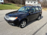 2013 Subaru Forester with 80,000 miles, ready for long drives and well-maintained by a certified mechanic.
