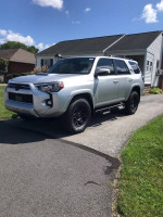 2023 Toyota 4Runner TRD Off-Road 4WD parked outside, showcasing premium features and rugged design.