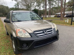 2006 Honda CR-V LX FWD in excellent condition, ready for the road with low mileage and well-maintained features.