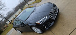2018 Audi A5 Premium Plus quattro Coupe in black, showcasing luxury design and features.