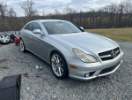 2006 Mercedes CLS55 for sale, features polished aluminum wheels and a new windshield.