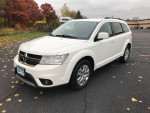 2018 Dodge Journey SXT in excellent condition, white exterior with 7 passenger seating and back-up camera.