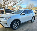 2018 Toyota RAV4 Limited FWD with low mileage, displaying sleek design and new all-weather tires