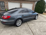2012 Volkswagen CC R-Line in gray with leather seats and alloy wheels parked in driveway.
