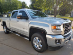 2018 GMC Sierra SLT Crew Cab 3500 HD 4WD in immaculate condition, with chrome accents and no winter damage.