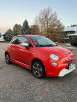 2014 FIAT 500e in red, compact electric car ideal for city commuting