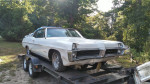 1967 Pontiac Catalina Convertible on a trailer, showcased in well-preserved condition, ideal for classic car enthusiasts.
