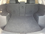 Interior view of the cargo space in a 2013 Mazda CX5, showing clean, spacious area for storage.