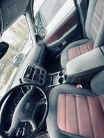 Interior of 2005 Ford Explorer XLT with clean dashboard and seats, available for sale in Brooklyn.