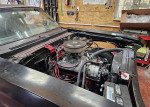 Engine view of a 1972 Chevrolet Nova with rebuilt components, showcasing performance upgrades and new parts.
