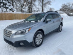 2016 Subaru Outback 2.5i AWD for sale, clean exterior and interior, great condition in snowy setting.
