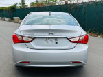 Rear view of a 2011 Hyundai Sonata GLS in silver, showcasing clean lines and modern design.